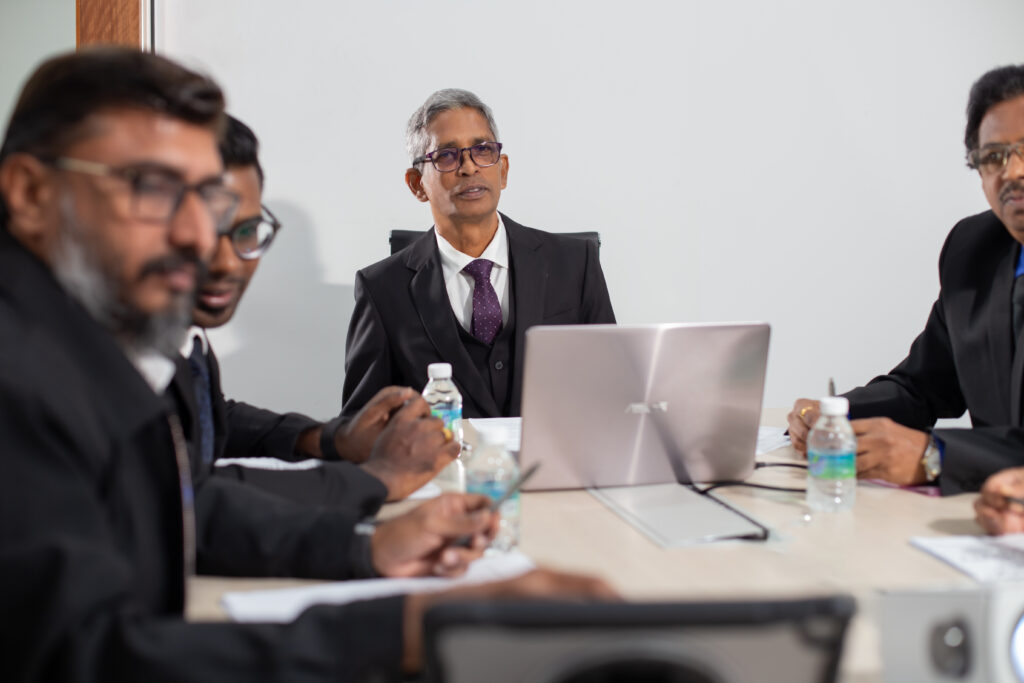 Ranama team members in an operational meeting
